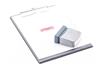 concept for business stamp approved on clipboard concept for business stamp approved on clipboard