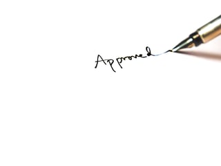 hand signing approval word one white paper hand signing approval word one white paper