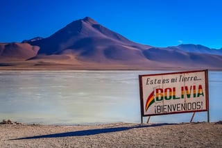 large board marking the border between Bolivia large board marking the border between Bolivia