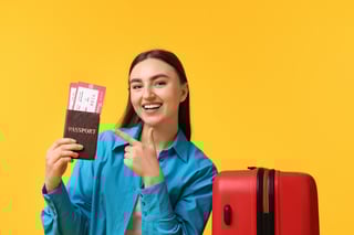 Woman With Tickets Passport And Suitcase On Orange Background Woman With Tickets Passport And Suitcase On Orange Background