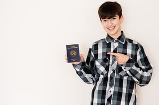 Young Teenager Boy Holding Paraguay Passport Looking Positive And Happy Standing Young Teenager Boy Holding Paraguay Passport Looking Positive And Happy Standing