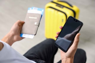 Traveller With Passport Flight Tickets And Smartphone Traveller With Passport Flight Tickets And Smartphone