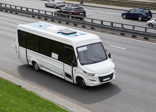 Passenger bus driving on road Passenger bus driving on road