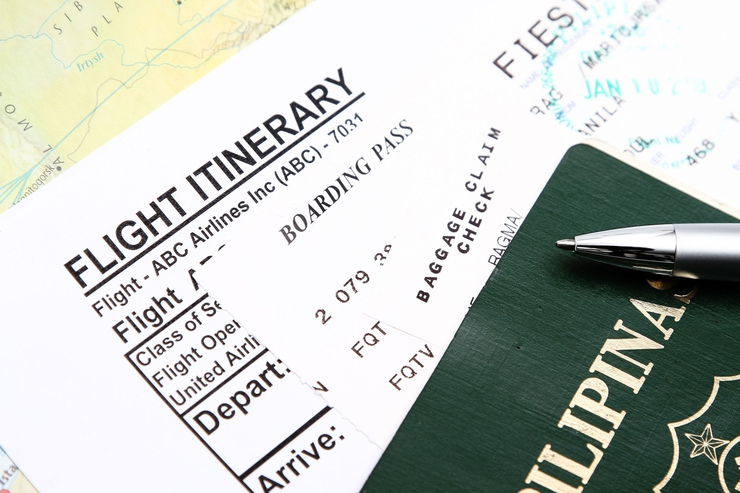 Passport and boarding pass with itinerary ticket Passport and boarding pass with itinerary ticket